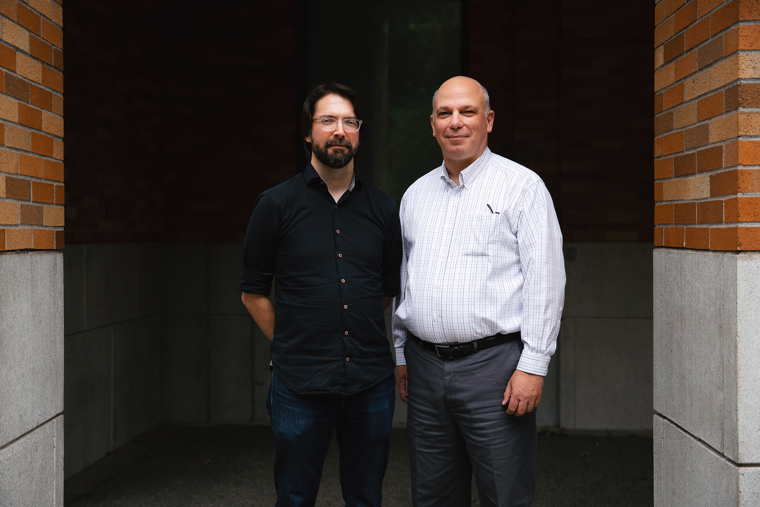 caption: Dr. Jeffrey Herron, left, an associate professor of neurological surgery at the University of Washington School of Medicine, and Dr. Jeffrey Ojemann, right, vice chair for discovery and professor of neurological surgery at the University of Washington School of Medicine, are portrayed on Tuesday, August 19, 2025, on the University of Washington campus in Seattle.