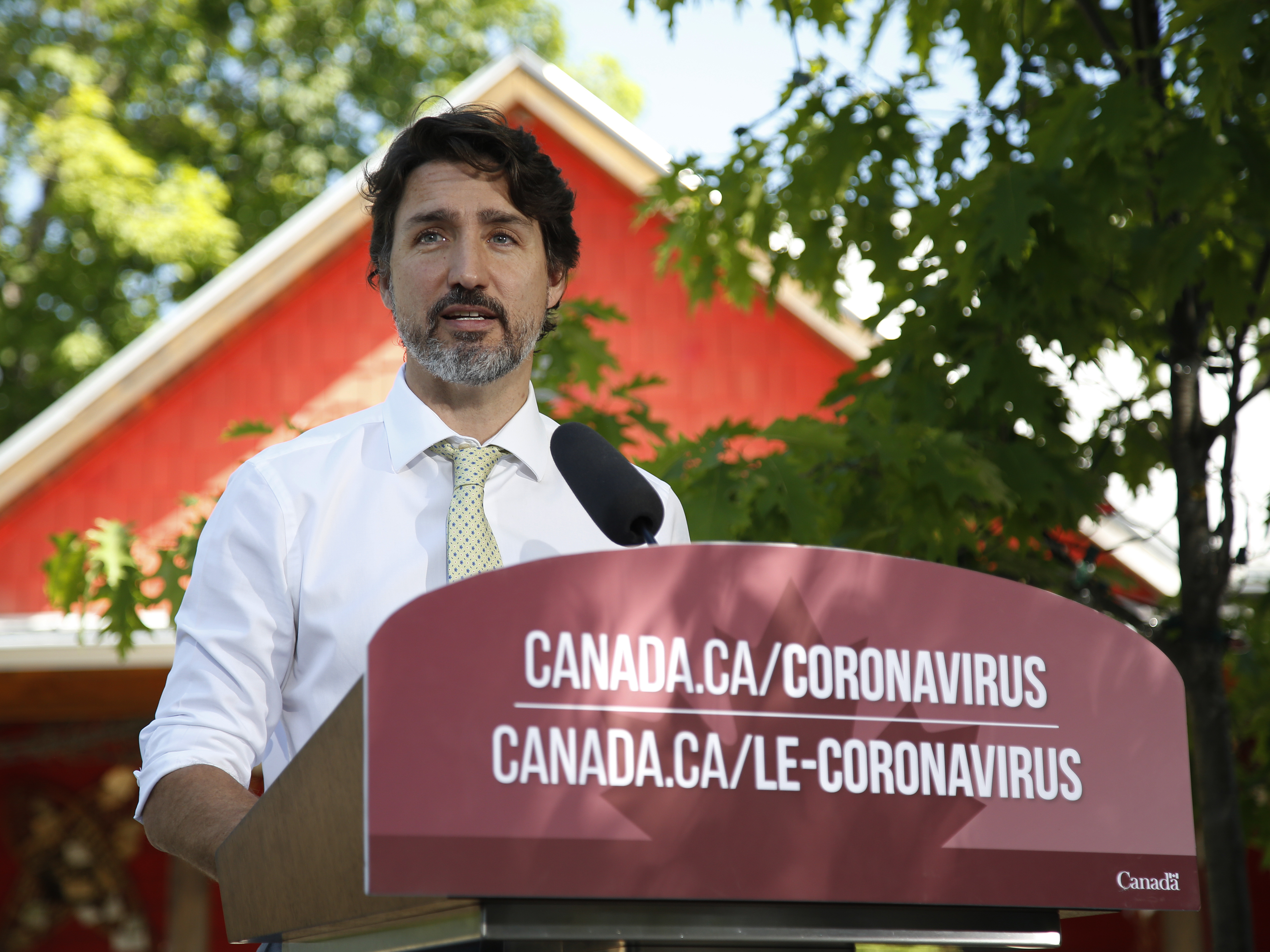 caption: Canadian Prime Minister Justin Trudeau speaks during a news conference in Chelsea, Quebec, Canada, last month.