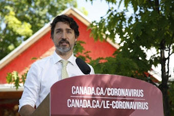 caption: Canadian Prime Minister Justin Trudeau speaks during a news conference in Chelsea, Quebec, Canada, last month.
