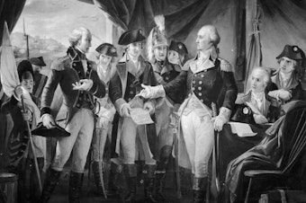 caption: October 1789: American Gen. George Washington declining to accept terms, after the siege of Yorktown, from British Gen. Charles Cornwallis (left), whose subsequent surrender practically ended the American War of Independence.