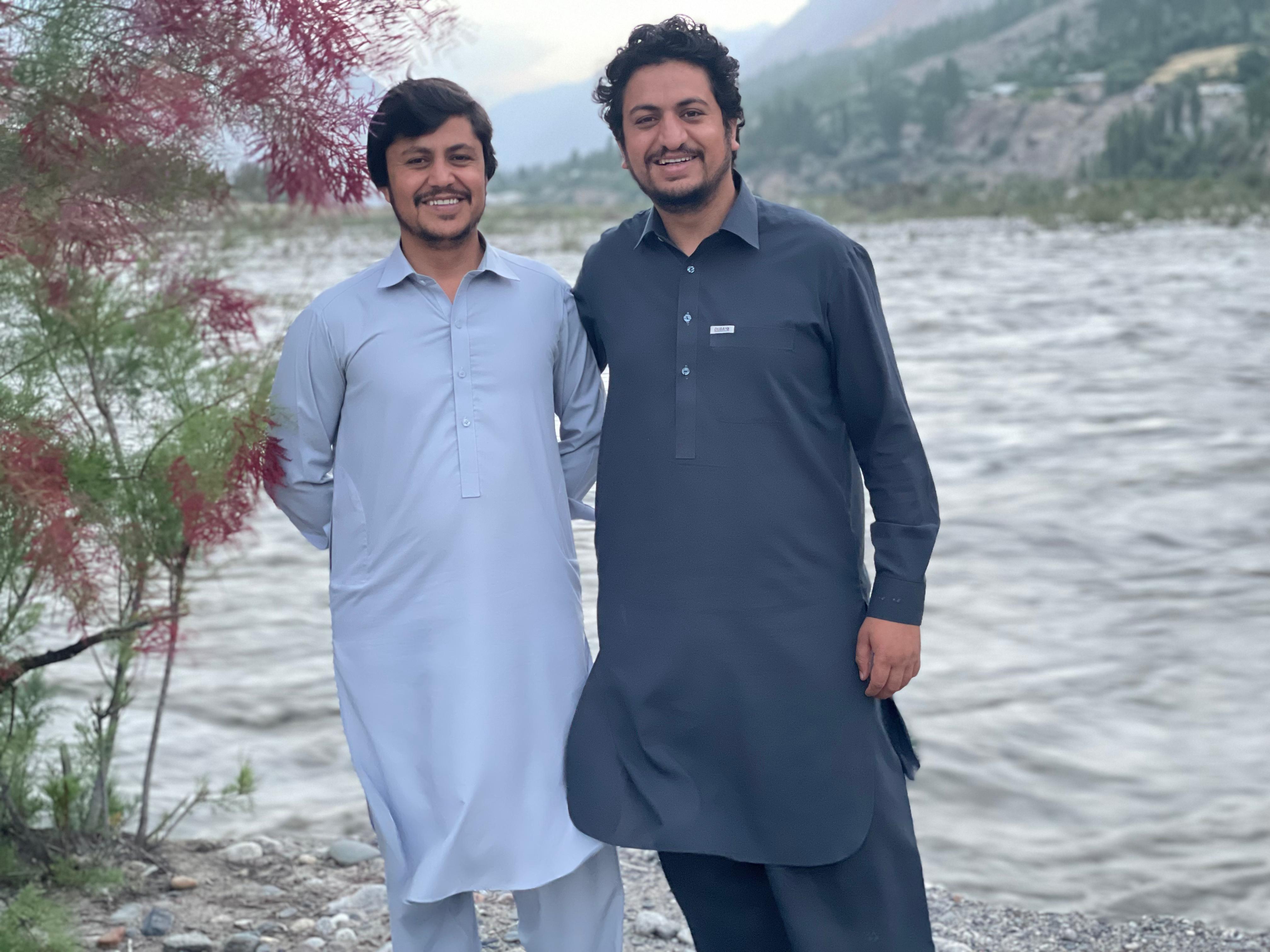 caption: Abdul Wahid Khan, the youngest son in his family (right), with his older brother Abdul Wajid Khan. Abdul Wahid says the fact that the youngest child is the heir doesn't mean other siblings are kicked out of the family home when the parents die. They often live there until they are adults.