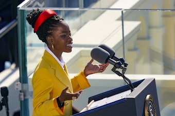 caption: Youth Poet Laureate Amanda Gorman speaks at the inauguration of U.S. President Joe Biden.