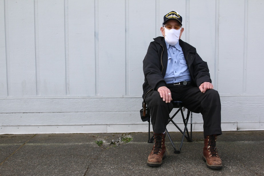 caption: Sailor Campbell waits for a bus on MLK in Tacoma's Hilltop neighborhood