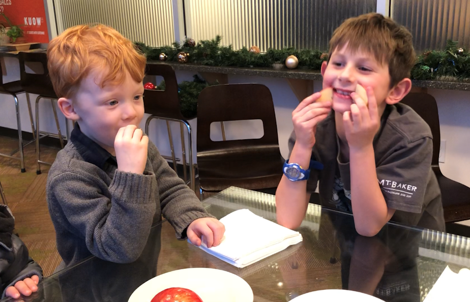 caption: Malcolm, 4 and Oliver, 6, recently took part in a blind test of Washington apples.