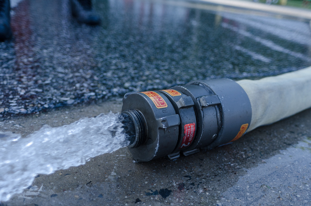 caption: Stock photo of fire hose.