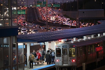 caption: In Chicago, the Kennedy Expressway is clogged with cars as rush-hour commuters and Thanksgiving holiday travelers mix on Wednesday — one of the busiest travel days of the year.
