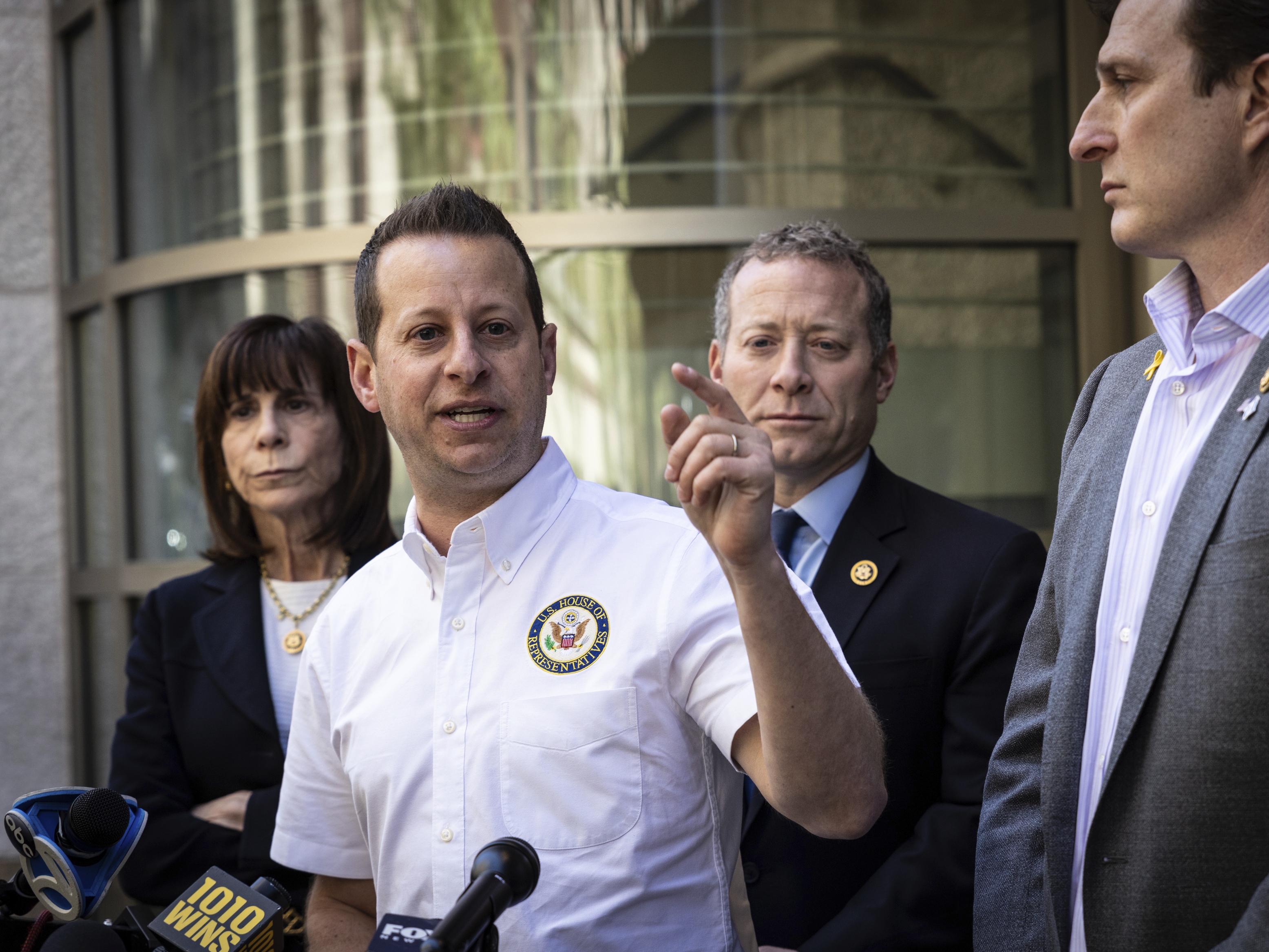 caption: Reps. Jared Moskowitz, Kathy Manning, Josh Gottheimer and Dan Goldman speak at a press conference in April about allegations of harassment and antisemitism against Jewish students at Columbia University.