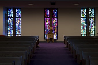 caption: The interior of the main sanctuary of Mount Zion Baptist Church is shown on Thursday, March 8, 2018, in Seattle.