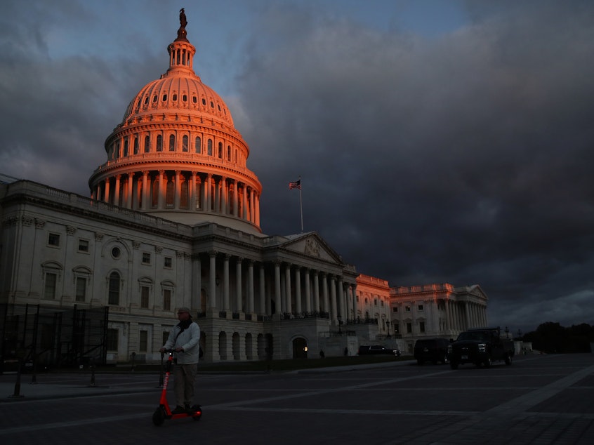caption: The early morning light hits the U.S. Capitol Building on Oct. 17.