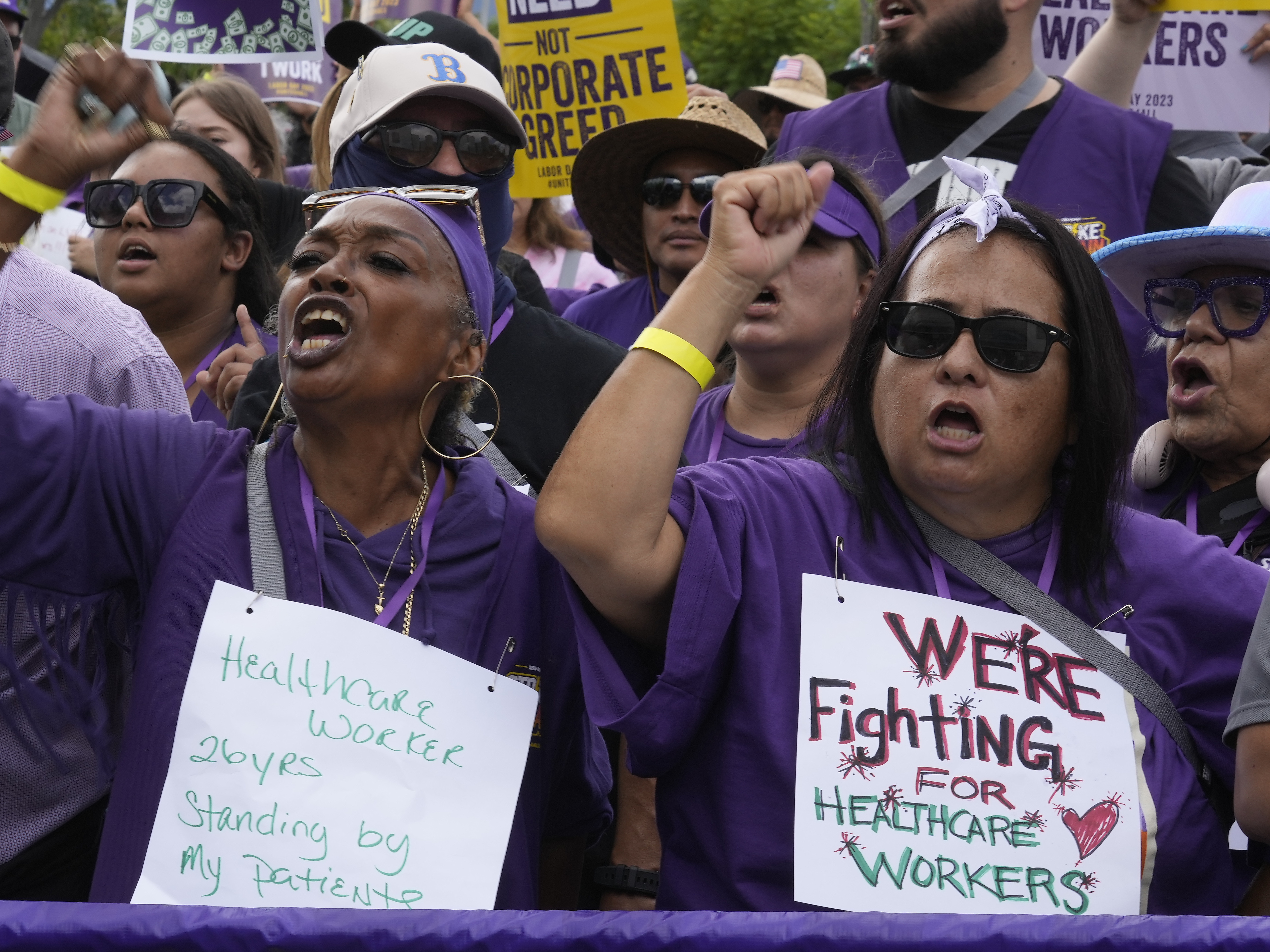 caption: Frontline health care workers hold a demonstration outside Kaiser Permanente Los Angeles Medical Center on September 4.
