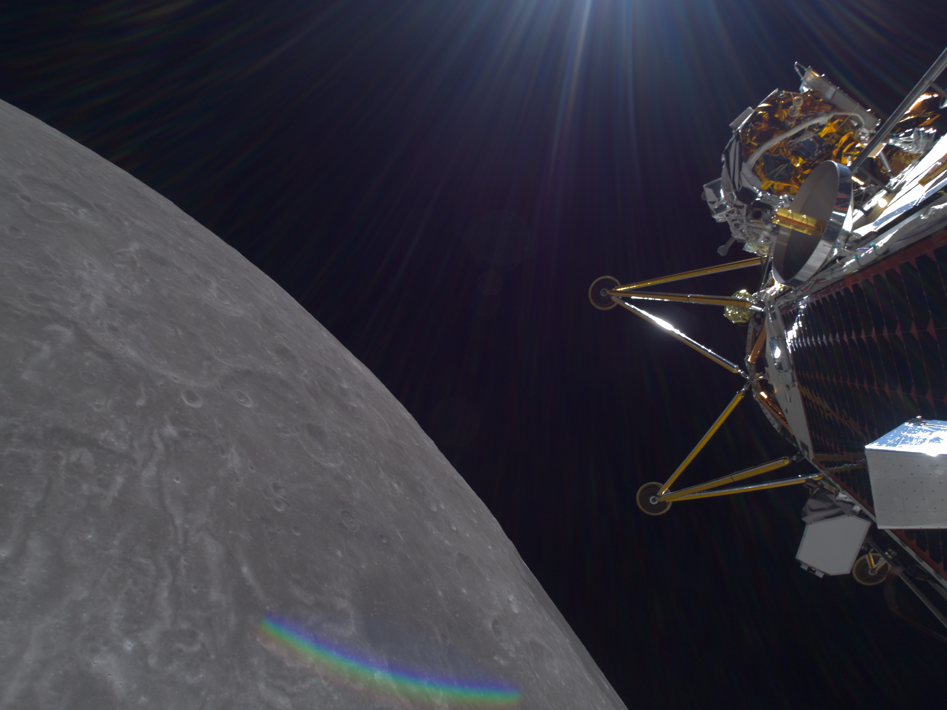 caption: A view of the moon from Intuitive Machine's Athena Lander.
