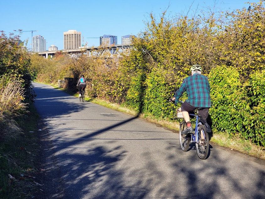 caption: Bicyclists on the Burke-Gilman Trail near U District on Thursday, October 5, 2023.