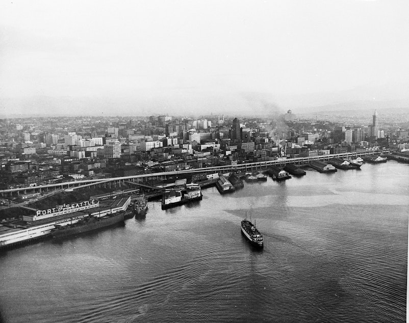 caption: Seattle waterfront and skyline, featuring the Alaskan Way Viaduct, 1952