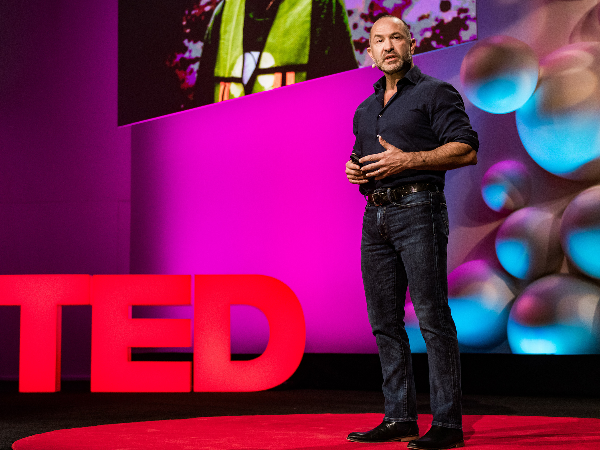 caption: David Katz on the TED stage