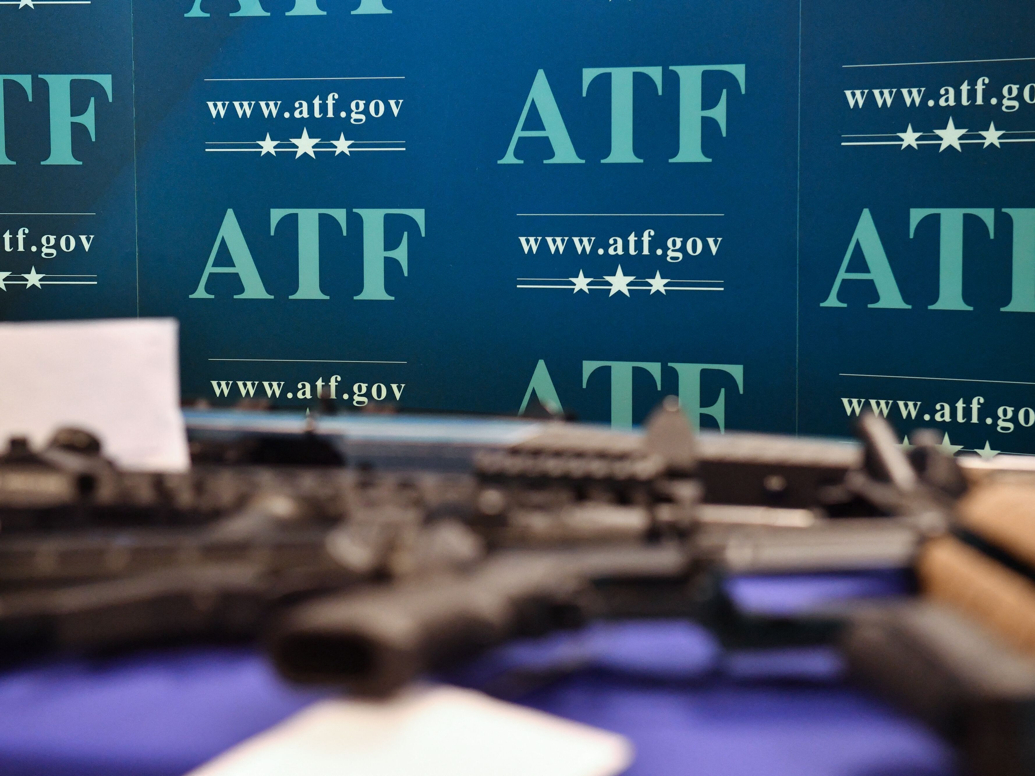 caption: "Ghost guns" seized in federal law enforcement actions are displayed at the Bureau of Alcohol, Tobacco, Firearms, and Explosives (ATF) field office in Glendale, Calif. on April 18, 2022. Former President Joe Biden imposed a host of restrictions on gun sellers. Some of those will be eased or eliminated as the Trump administration restructures the ATF.
