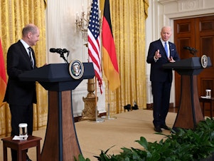 caption: President Biden speaks during a joint news conference with German Chancellor Olaf Scholz at the White House on Monday.
