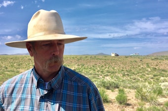caption: Jon Griggs has been ranching in northern Nevada for more than 30 years. Fires have always been a part of this landscape, he says, but in the past 20 years he's seen a significant increase.