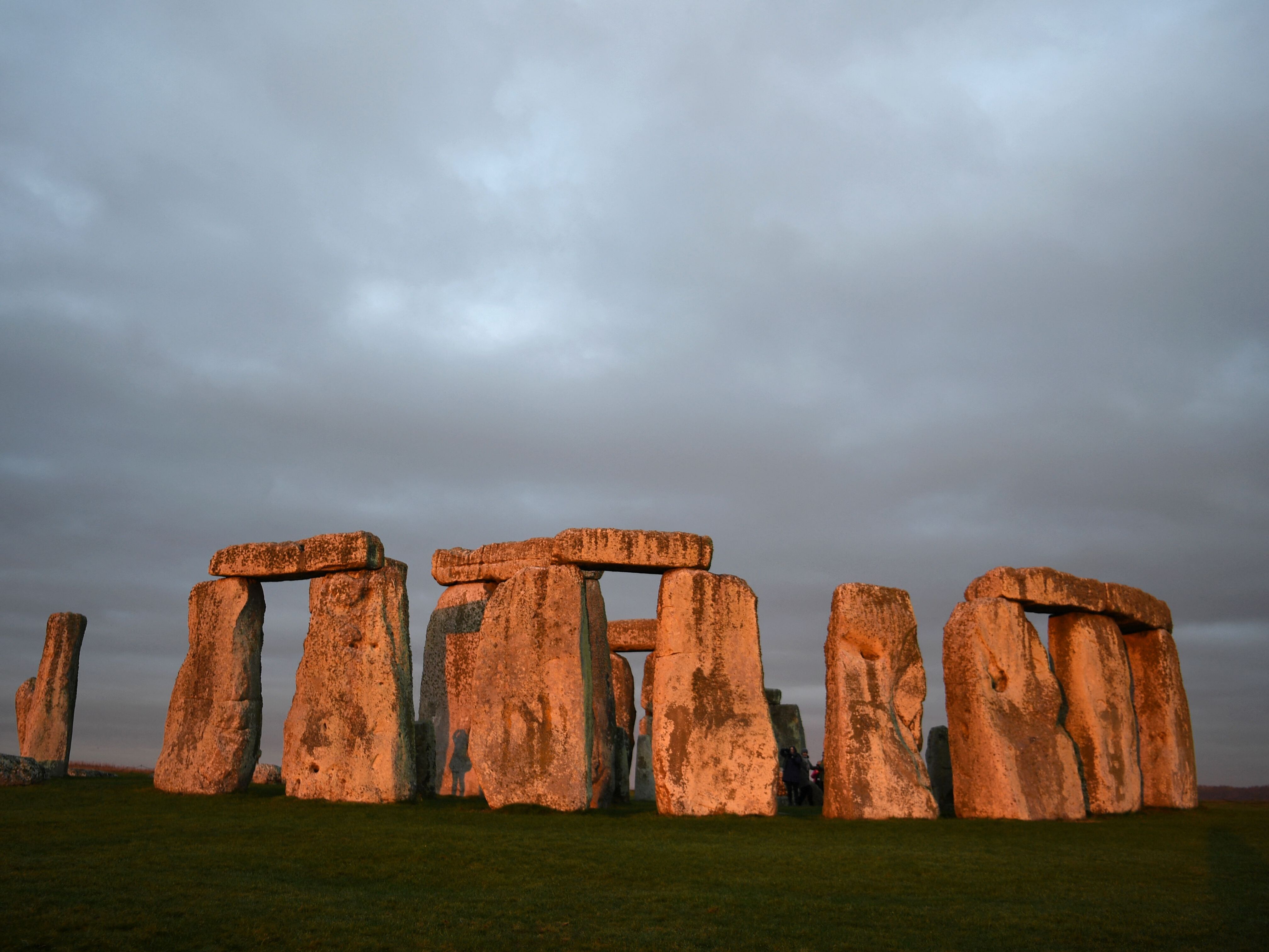 caption: The prehistoric monument Stonehenge, near Amesbury in southern England, has long fascinated researchers and visitors. 
