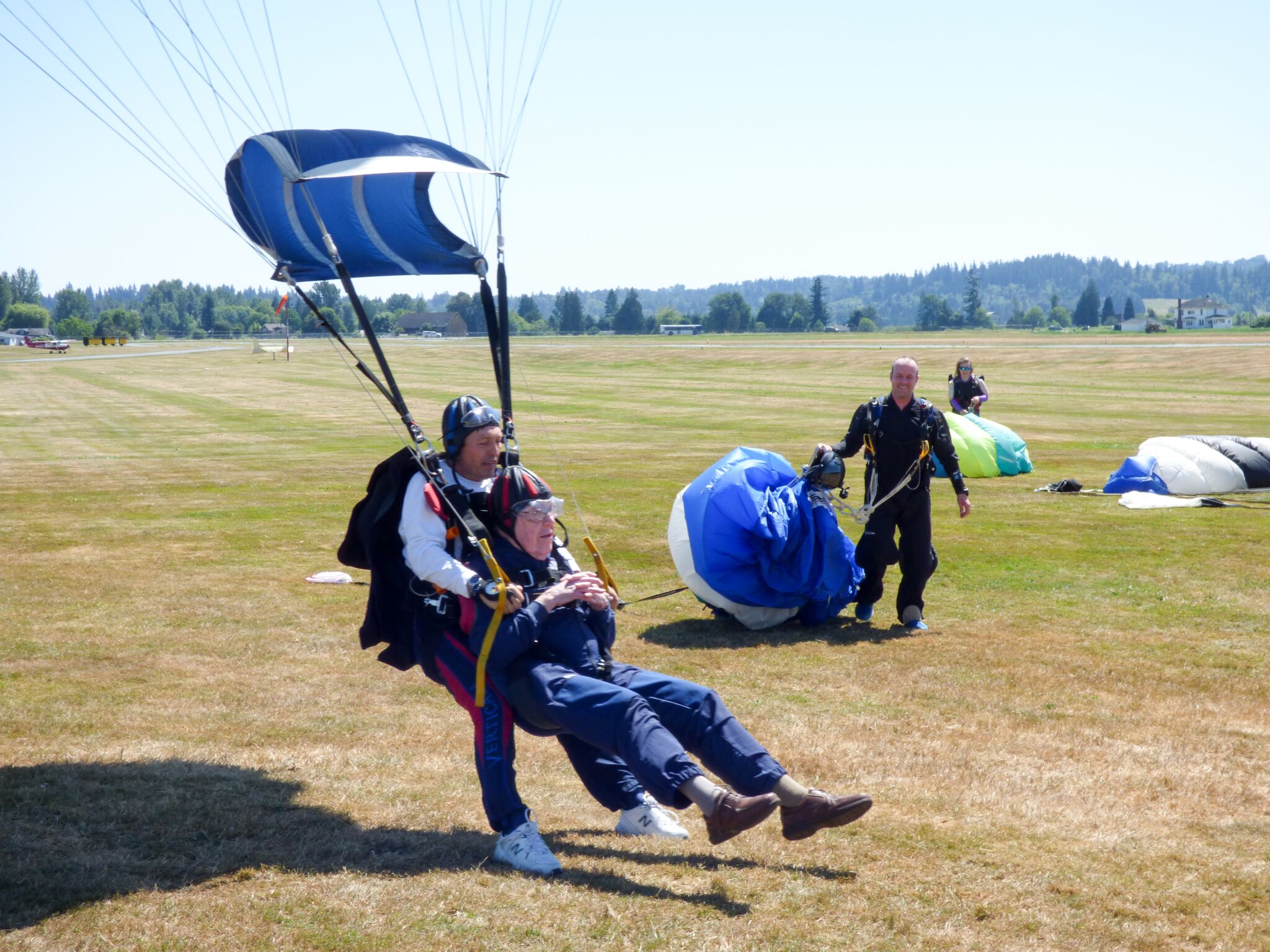 caption: Stuart Williamson and his instructor come in for a smooth landing.