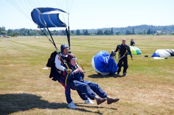 caption: Stuart Williamson and his instructor come in for a smooth landing.