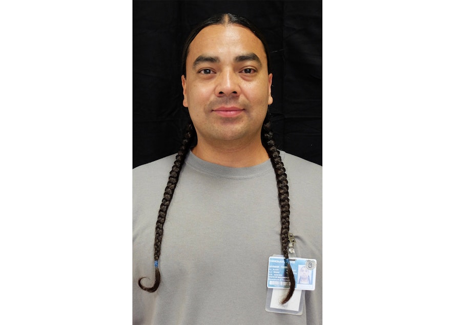 caption: Travis ComesLast says his family is one of the biggest motivators for him to continue making positive changes wherever he can, as he serves a 51 year prison sentence for crimes he committed before he was 21 years old.