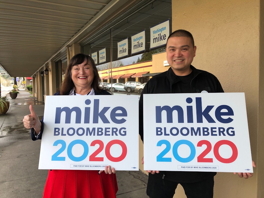 caption: While Mike Bloomberg has pulled out, the campaign will pay for field organizers like Michele Valenti, left, and Joni Gutierrez to work for other Democrats through November. 