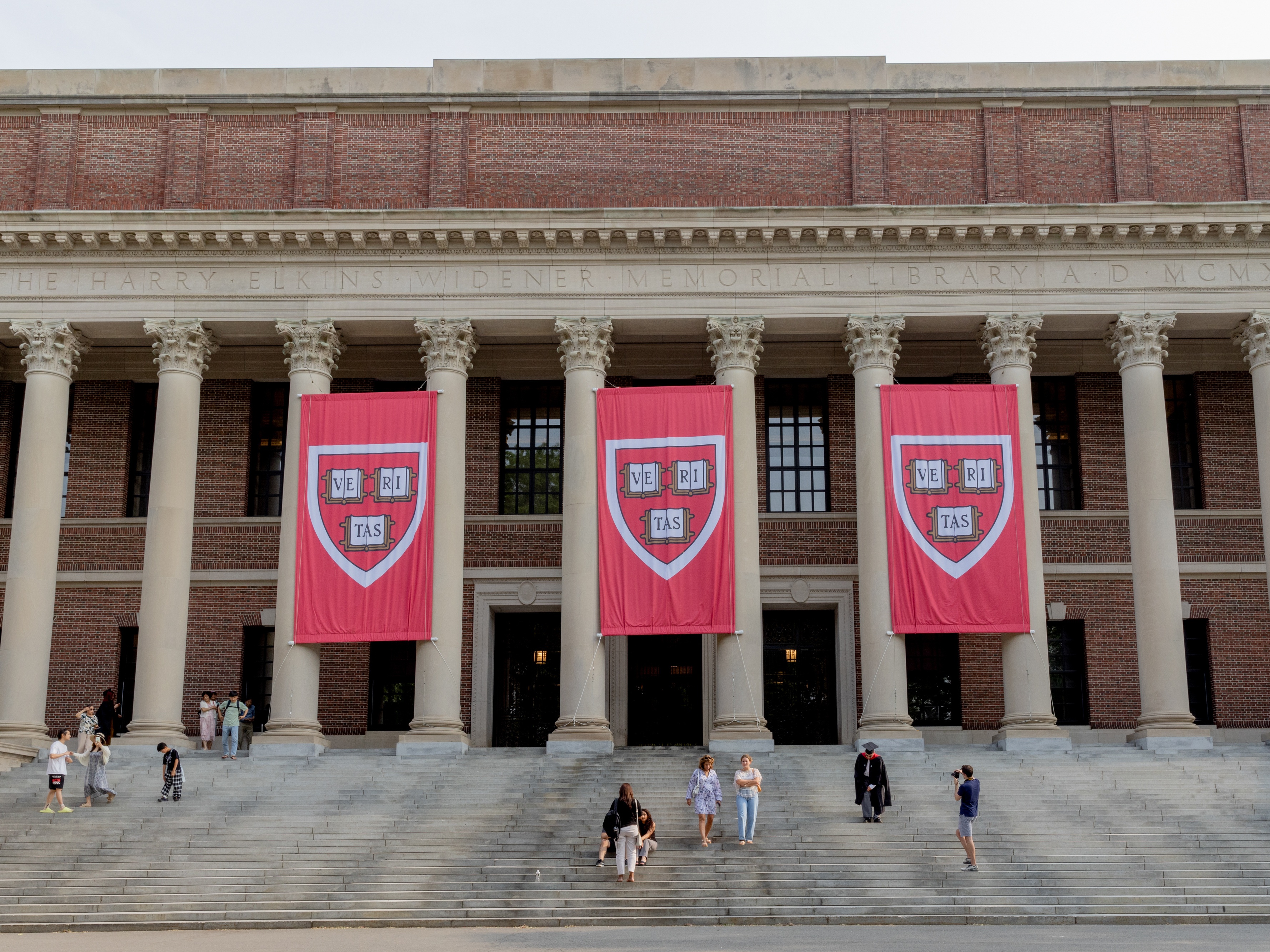 caption: The Widener Library on the Harvard University Campus in Cambridge, Mass. Harvard is at the forefront of the Trump administration's efforts to reshape higher education.