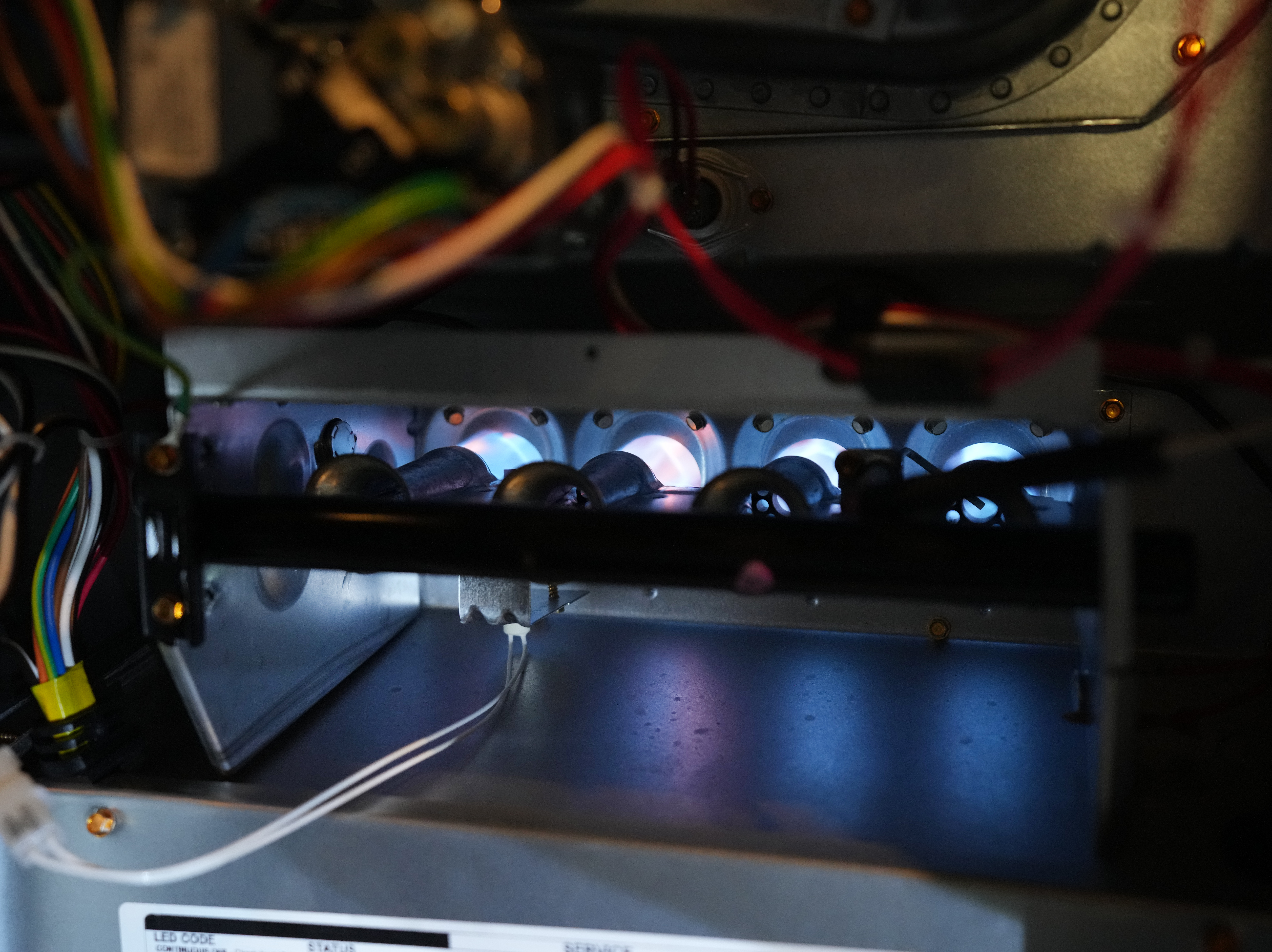caption: A gas furnace in a residential home. California plans to require zero-emission heaters and furnaces by the end of the decade.