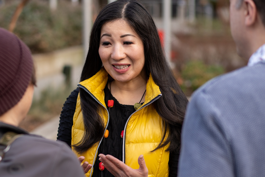 caption: A photo for Tanya Woo's 2023 Seattle City Council campaign. 