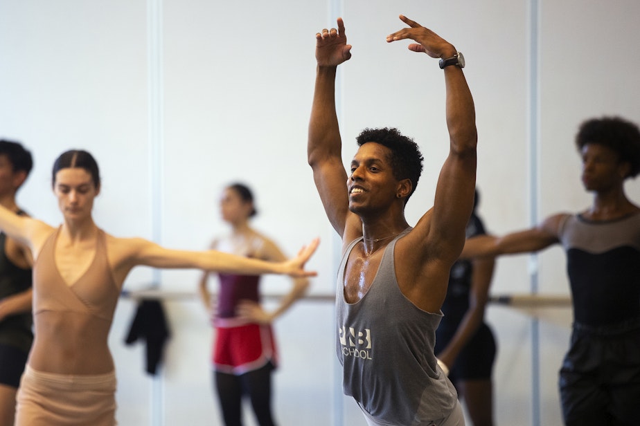 caption: Jonathan Batista, the first Black principal dancer in the history of the Pacific Northwest Ballet, rehearses on Monday, October 17, 2022, in Seattle. 