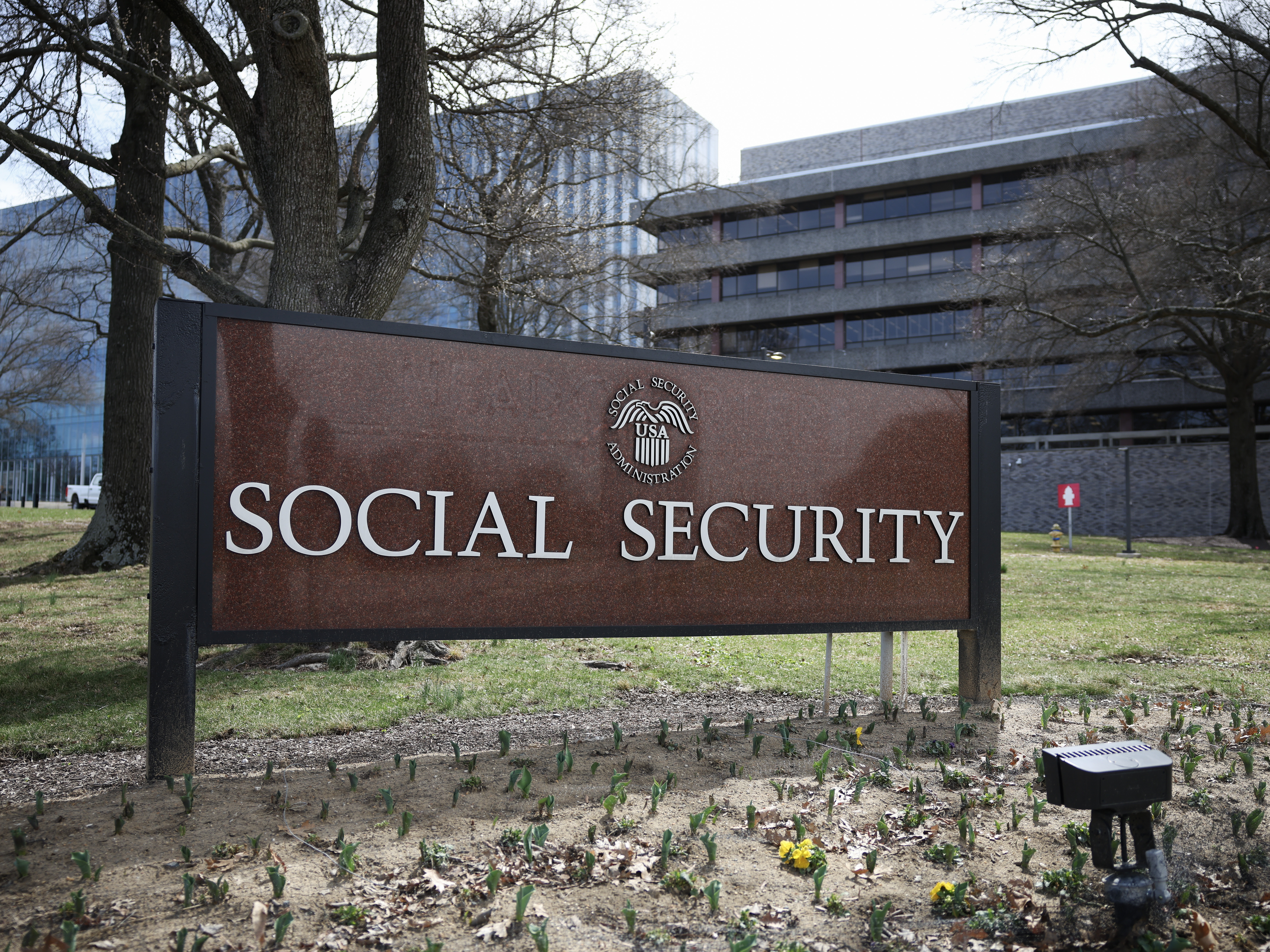 caption: The entrance of the Social Security Administration's main campus in Woodlawn, Md., is seen on Wednesday.