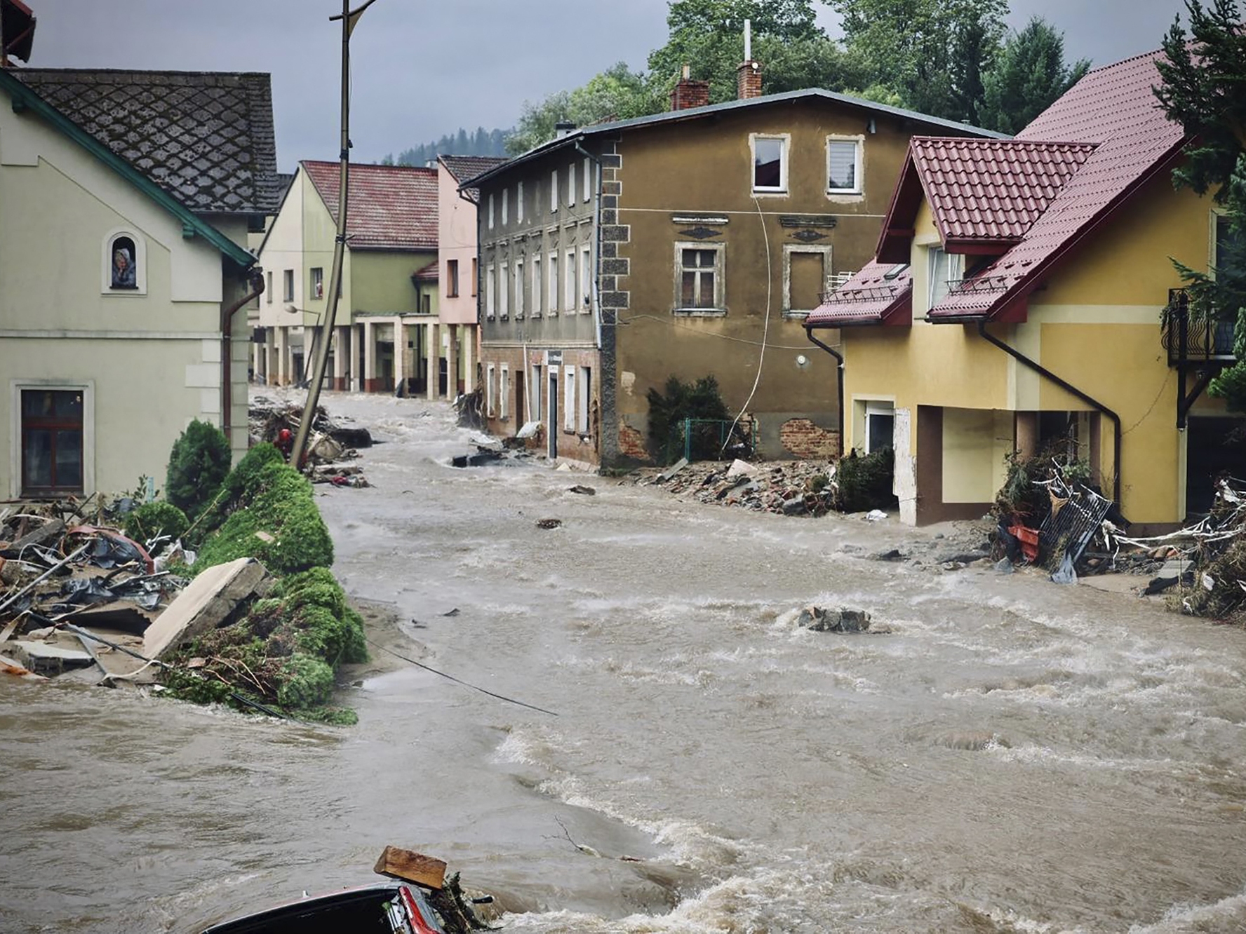 caption: Rain inundated Central and Eastern Europe in early September, causing massive flooding, including in the town of Nysa, southwestern Poland. A new study finds that human-caused climate change roughly doubled the likelihood of that intense rainfall.