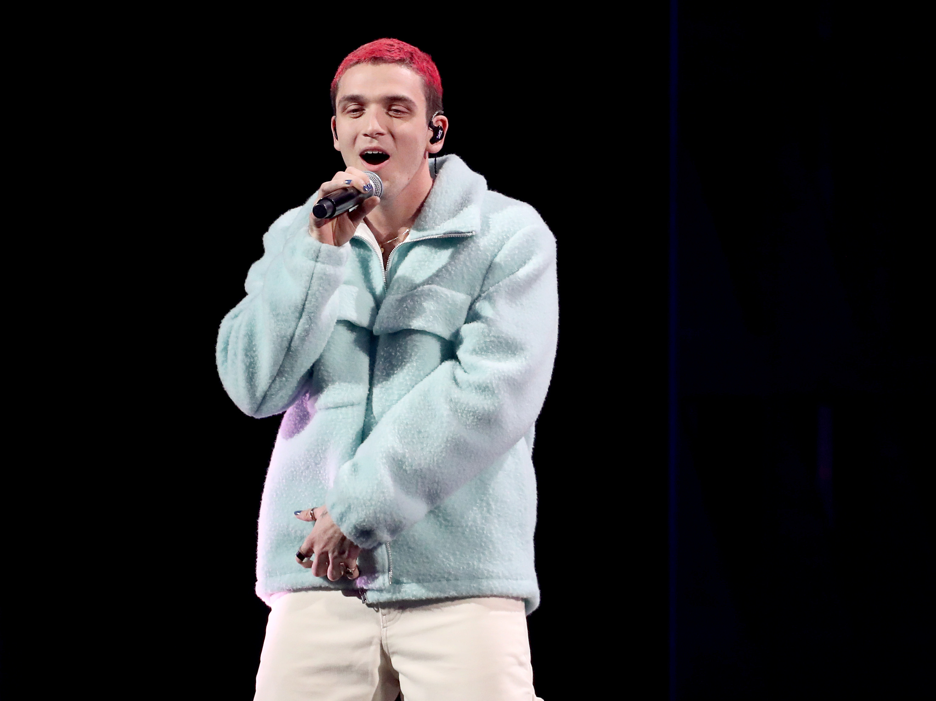 caption: Lauv performs onstage at Madison Square Garden on Dec. 13, 2019 in New York City. His new album <em>~how i'm feeling~ </em>tackles feelings of depression and anxiety.