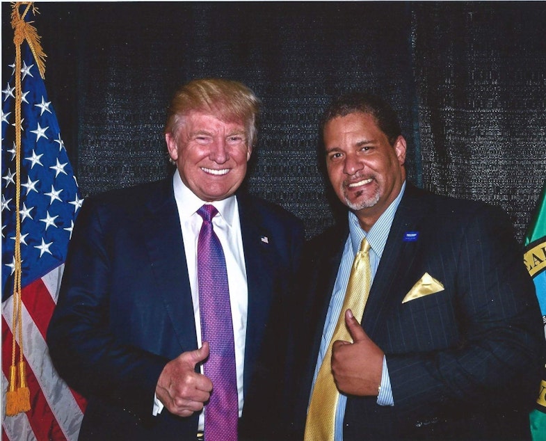caption: President Donald Trump with Tony Barger. 