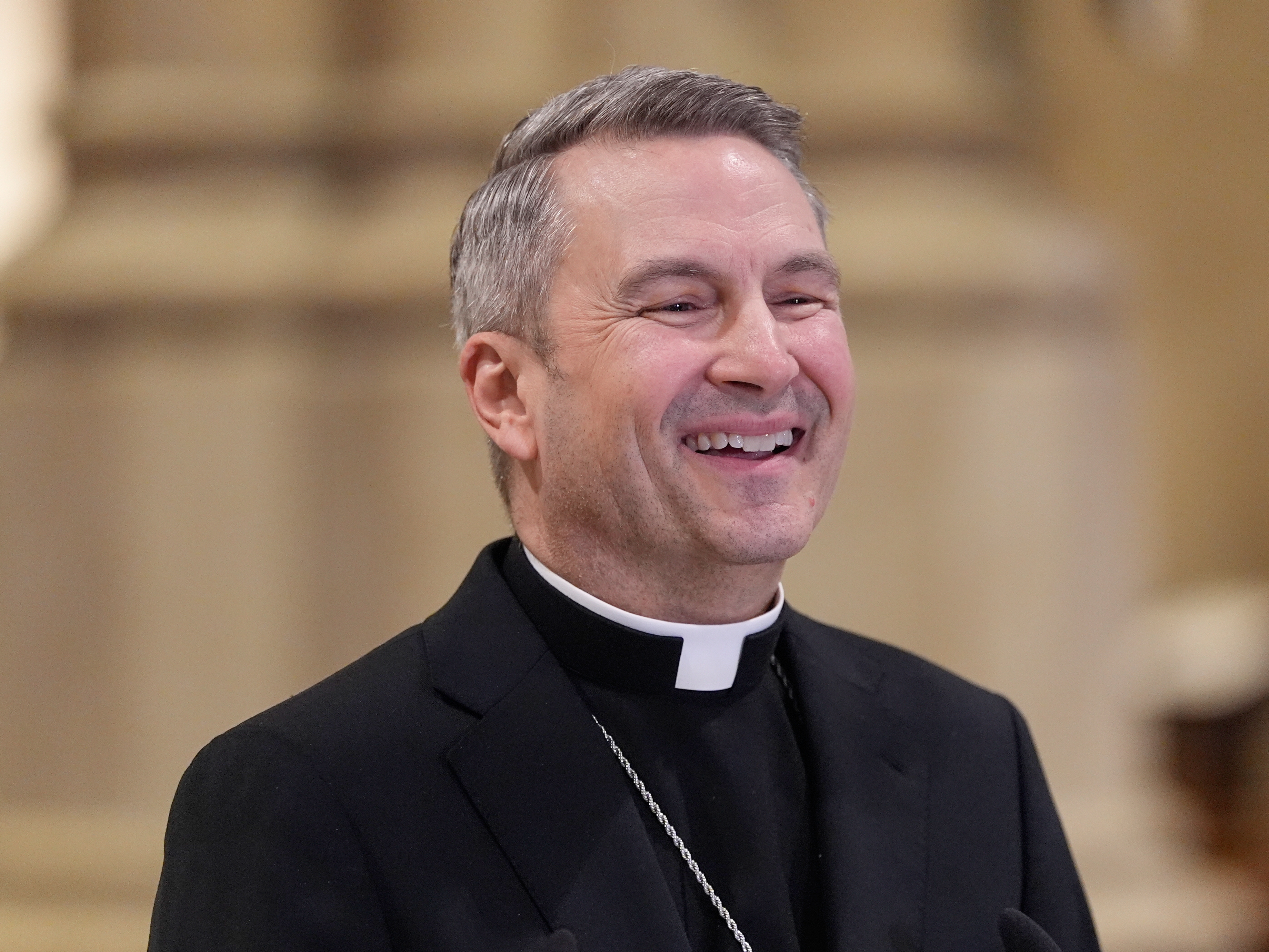 caption: Archbishop-designate Ronald Hicks laughs during a news conference at St. Patrick's Cathedral in New York, Thursday, Feb. 5, 2026.