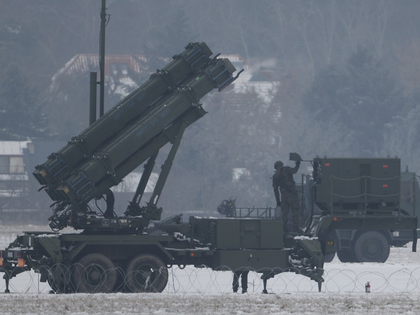 caption: Patriot missile launchers acquired from the U.S. are seen deployed in Warsaw, Poland, in February.