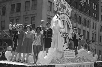 caption: Members of the International Ladies' Garment Workers' Union are seen on a Labor Day parade float, Sept. 4, 1961. While many may associate the holiday with major retail sales and end-of summer barbecues, Labor Day's roots are in worker-driven organizing.