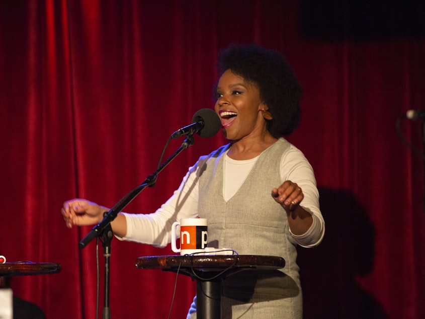 caption: Amber Ruffin appears on <em>Ask Me Another</em> at the Bell House in Brooklyn, New York.