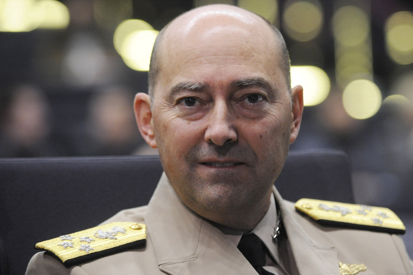 caption: U.S. Admiral James Stavridis, NATO Supreme Allied Commander Europe, looks on during the Global Forum conference in Wroclaw, Poland, Friday, Oct. 8, 2010. (Alik Keplicz/AP)