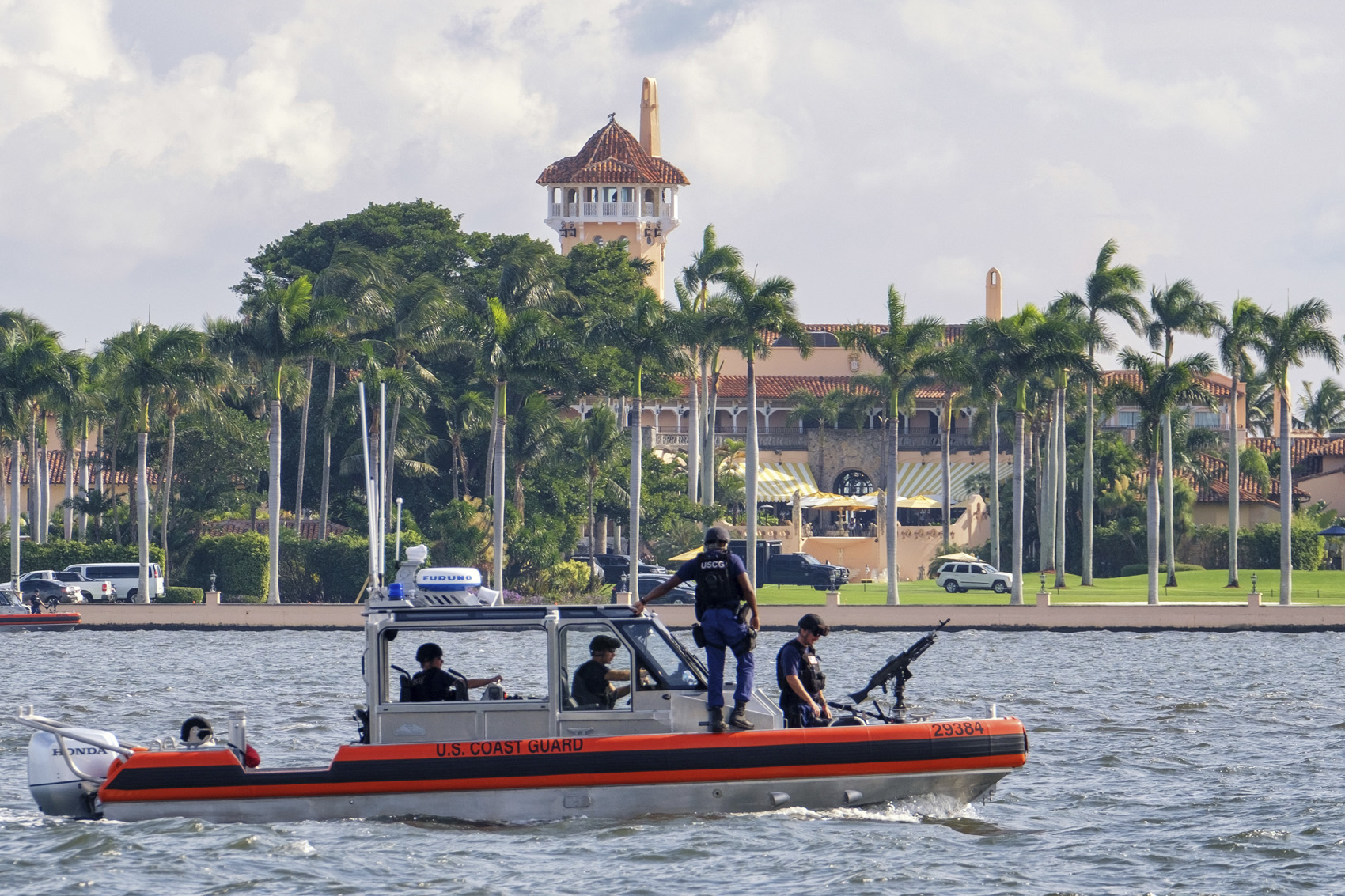 caption: The U.S. Coast Guard patrol boat passes President Donald Trump's Mar-a-Lago estate in Palm Beach, Fla., Thursday, Nov. 22, 2018. (J. David Ake/AP)