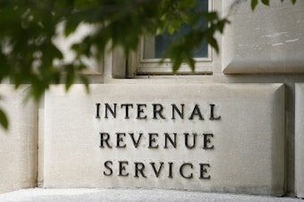 caption: A sign outside the Internal Revenue Service building in Washington, on May 4, 2021.