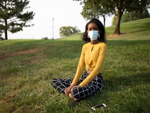 caption: Huda Mohamed, a student at James Madison University in Harrisonburg, Va., has an immunodeficiency. She decided to take extra precautions by using Virginia's COVIDWISE app, which alerts users who may have been exposed to the coronavirus. Such apps are only available in a few states.