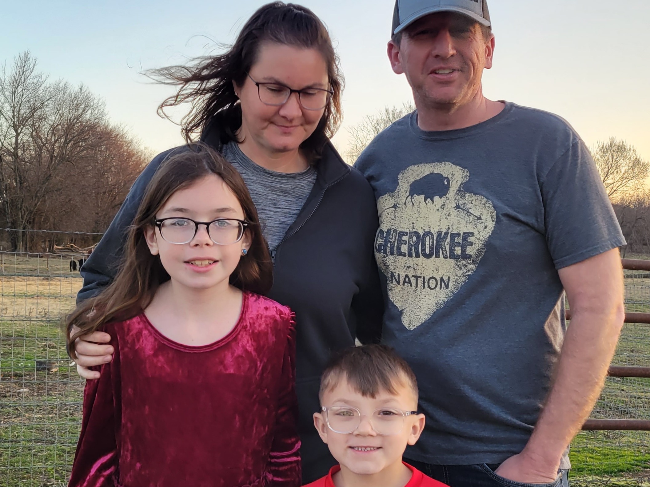 caption: "They are thriving," says Gary Walker of his adopted children Mazzy and Ransom.  The hope is that with better addiction care, more Cherokee children can remain in intact families.