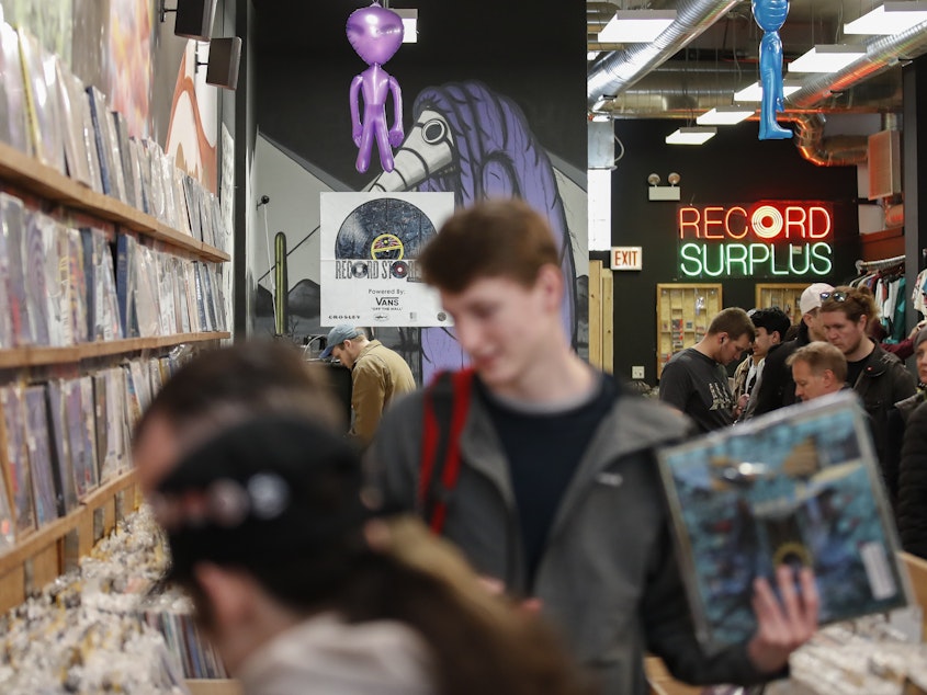 caption: Customers shop at the Shuga Records store during the Record Store Day in Chicago on April 13, 2019. Vinyl record sales have been on the rise for 16 straight years, with an extra bump in demand during the pandemic.