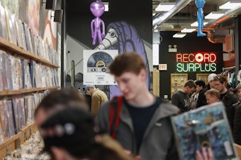 caption: Customers shop at the Shuga Records store during the Record Store Day in Chicago on April 13, 2019. Vinyl record sales have been on the rise for 16 straight years, with an extra bump in demand during the pandemic.