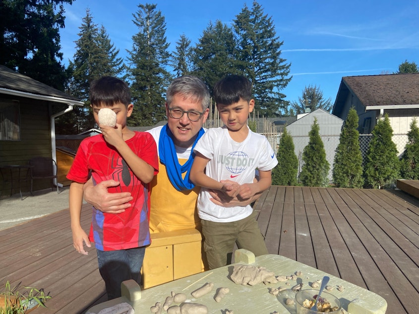 caption: Ceramic pottery artist Bryan Ohno, and his grandsons.