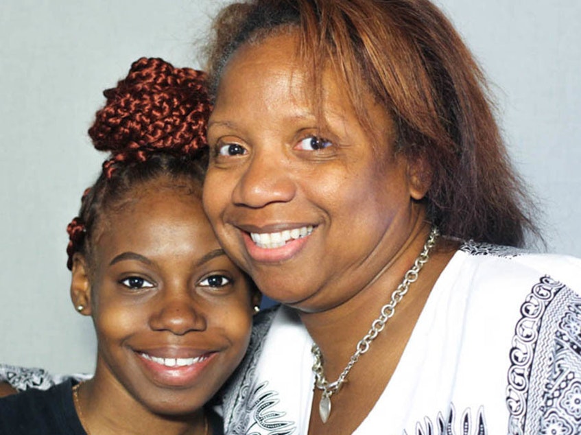 caption: When Jade Rone, left, was first taken into Stacia Parker's care, she kept her feelings to herself. At their StoryCorps interview in Philadelphia in June 2019, Parker told her, "I was trying to develop your voice."