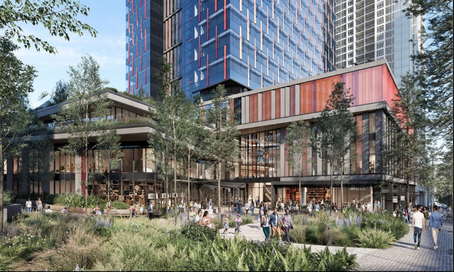 caption: The base of Amazon's proposed office tower in Bellevue, with an open space facing the Grand Connection