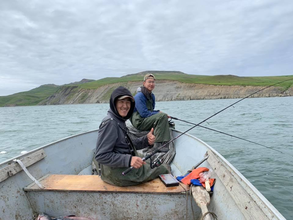 caption: Ethan Lincoln, 17, fishes for king salmon and red salmon with his cousin Avery Tulik in the Kangirlvar Bay, Alaska.