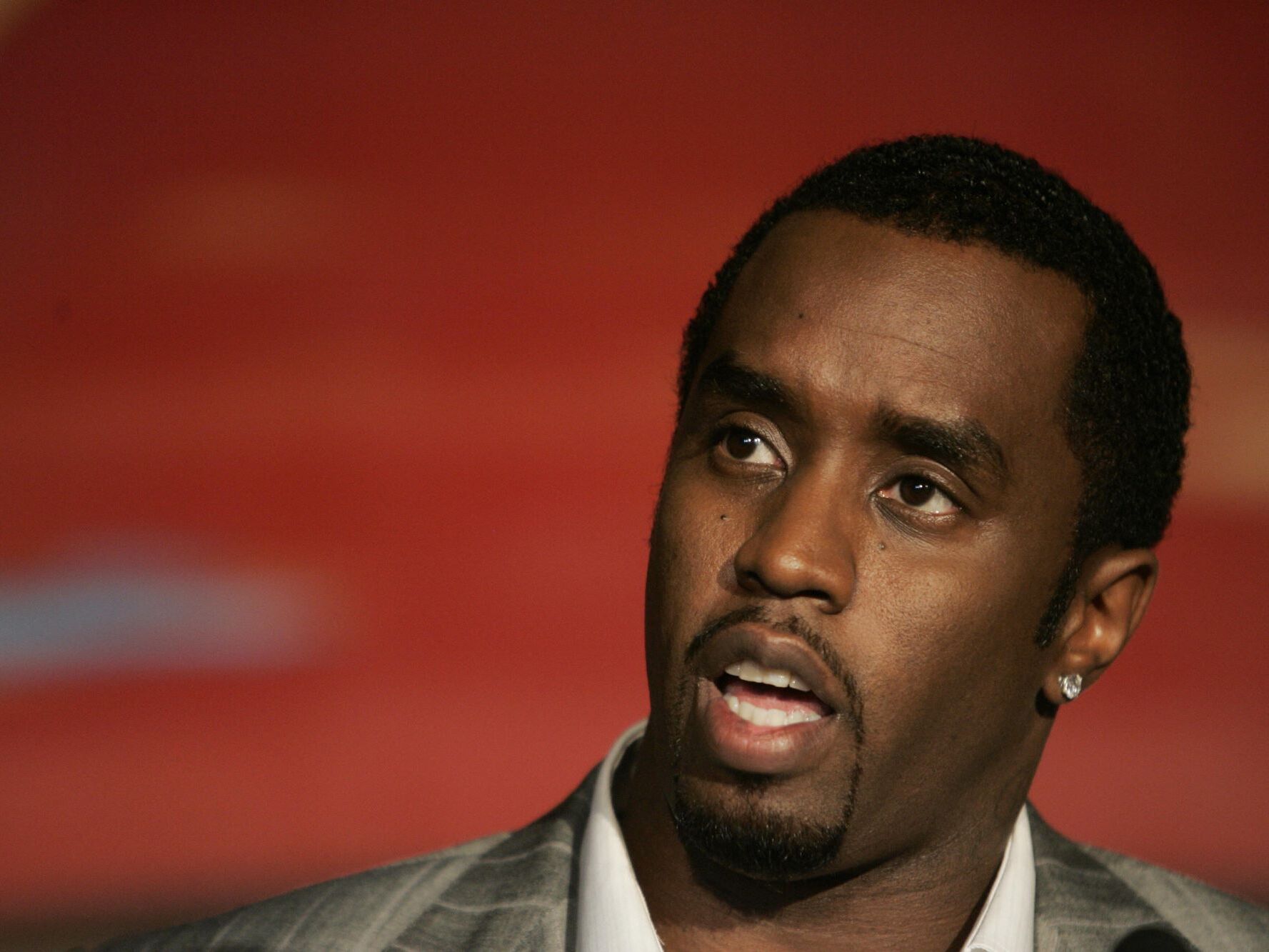 caption: Sean "Diddy" Combs speaks at press conference, 24 October 2007, announcing an alliance with Ciroc Vodka in New York. Sean Combs Enterprises will make branding decisions for Ciroc and will share in future profits from the vodka made by Diageo.